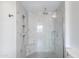 Bathroom featuring a modern shower and decorative tile work at 5401 E Van Buren St # 1004, Phoenix, AZ 85008