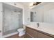Bathroom featuring modern fixtures, a new shower, and a dual sink vanity at 5401 E Van Buren St # 1004, Phoenix, AZ 85008
