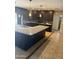 Modern kitchen featuring granite countertops, dark cabinets, and stylish pendant lighting at 5542 W Monte Cristo Ave, Glendale, AZ 85306