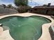 Private in-ground pool surrounded by a paved patio perfect for outdoor entertaining and relaxation at 5542 W Monte Cristo Ave, Glendale, AZ 85306
