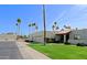 Charming single story home with a lush green lawn and a two car garage from street at 629 E State Ave, Phoenix, AZ 85020