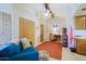 Cozy living area with comfortable seating, desk space and natural light at 629 E State Ave, Phoenix, AZ 85020