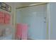 Shower featuring glass doors and modern fixtures at 629 E State Ave, Phoenix, AZ 85020