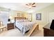 Cozy bedroom with carpet, ceiling fan, and bright natural light at 6439 W Kristal Way, Glendale, AZ 85308