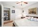 Bedroom featuring a cozy bed and an en-suite storage area at 6439 W Kristal Way, Glendale, AZ 85308