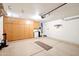 Spacious garage with built-in storage cabinets and epoxy flooring provides ample room at 6439 W Kristal Way, Glendale, AZ 85308