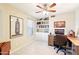 Comfortable home office with custom built-ins and a large window at 6439 W Kristal Way, Glendale, AZ 85308