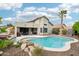 Backyard featuring a sparkling pool, perfect for relaxing and entertaining in the Arizona sun at 6439 W Kristal Way, Glendale, AZ 85308