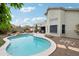 Backyard pool and patio area creates the perfect space for relaxation and entertaining at 6439 W Kristal Way, Glendale, AZ 85308