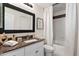 Clean bathroom with granite countertops, white cabinetry, and shower-tub combination at 6900 E Princess Dr # 2247, Phoenix, AZ 85054