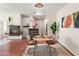 Charming dining area featuring a modern chandelier and breakfast bar with a stone facade at 6900 E Princess Dr # 2247, Phoenix, AZ 85054