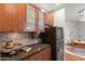 Bright kitchen featuring stainless steel appliances, granite countertops, and stylish cabinetry at 6900 E Princess Dr # 2247, Phoenix, AZ 85054