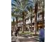 The community includes this pedestrian-friendly shopping center with beautiful palm trees at 6900 E Princess Dr # 2247, Phoenix, AZ 85054