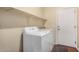 Laundry room with shelving and washer and dryer hookups at 726 E Heather Dr, San Tan Valley, AZ 85140