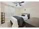 Cozy bedroom with a ceiling fan and neutral colors providing a relaxing space at 7262 W Firebird Dr, Glendale, AZ 85308
