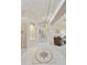 Spacious hallway with tile floors, display niches, and views into the living areas at 7262 W Firebird Dr, Glendale, AZ 85308