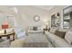 Bright living room boasts neutral colors, modern furniture, and lots of natural light at 7262 W Firebird Dr, Glendale, AZ 85308