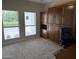 Bedroom with carpet, built-ins, and windows at 7272 E Gainey Ranch Rd # 122, Scottsdale, AZ 85258