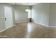 Inviting dining room featuring elegant lighting and neutral tile flooring at 7272 E Gainey Ranch Rd # 122, Scottsdale, AZ 85258