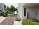 Charming home with a lovely front yard featuring a water fountain and beautiful landscaping at 7272 E Gainey Ranch Rd # 122, Scottsdale, AZ 85258