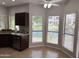 Charming breakfast nook with picturesque views of the lake and lush greenery at 7272 E Gainey Ranch Rd # 122, Scottsdale, AZ 85258