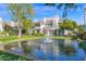 Charming residential area with a pond and fountain, creating a tranquil and inviting atmosphere at 7272 E Gainey Ranch Rd # 122, Scottsdale, AZ 85258