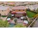 Aerial view of private backyard featuring a covered patio, pool, and well-manicured lawn at 7503 S Roanoke St, Gilbert, AZ 85298