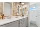 Stylish bathroom with double vanity, granite counters, and a separate shower at 7503 S Roanoke St, Gilbert, AZ 85298