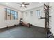 Exercise room with natural light and a variety of workout equipment at 7503 S Roanoke St, Gilbert, AZ 85298