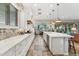Spacious kitchen with a long island, ample counter space, stainless appliances and open sightlines at 7503 S Roanoke St, Gilbert, AZ 85298