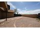 Large backyard featuring both rocks and a tiled patio at 8023 N 49Th Ave, Glendale, AZ 85302
