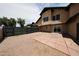 Large backyard featuring a tile patio and spacious yard, perfect for outdoor activities at 8023 N 49Th Ave, Glendale, AZ 85302