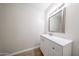 Bathroom featuring a sink in a white vanity with a mirror at 8023 N 49Th Ave, Glendale, AZ 85302