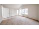 Bright bedroom featuring a big window and closet space provides natural light at 8023 N 49Th Ave, Glendale, AZ 85302