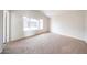 Bedroom featuring carpet flooring and a window at 8023 N 49Th Ave, Glendale, AZ 85302