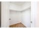Spacious walk-in closet with shelving offers ample storage at 8023 N 49Th Ave, Glendale, AZ 85302