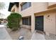 Home exterior featuring well maintained landscaping and neutral paint at 8023 N 49Th Ave, Glendale, AZ 85302