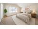 Spacious main bedroom featuring a large window and neutral decor at 8023 N 49Th Ave, Glendale, AZ 85302