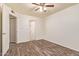 Spacious bedroom with modern flooring and ceiling fan at 8155 E Roosevelt St # 205, Scottsdale, AZ 85257