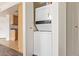 Conveniently located in-unit laundry closet with stacked washer and dryer at 8155 E Roosevelt St # 205, Scottsdale, AZ 85257