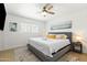 Bedroom with modern decor, featuring a neutral color palette and decorative wall art at 8315 E Devonshire Ave, Scottsdale, AZ 85251