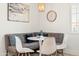 Cozy dining nook with modern seating and stylish decor, creating a warm and inviting space at 8315 E Devonshire Ave, Scottsdale, AZ 85251