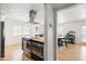 Kitchen featuring granite counters and stainless steel appliances, offering a view of the dining area at 8315 E Devonshire Ave, Scottsdale, AZ 85251