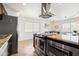 Kitchen view showcasing stainless steel appliances, granite counters, and open layout at 8315 E Devonshire Ave, Scottsdale, AZ 85251