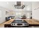 Bright kitchen with granite counters and an open design that flows into the dining area at 8315 E Devonshire Ave, Scottsdale, AZ 85251