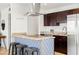 Beautiful kitchen features stainless steel appliances, updated cabinets and a breakfast bar with seating at 8315 E Devonshire Ave, Scottsdale, AZ 85251