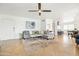 Open-concept living room featuring modern furnishings, stylish decor, and a ceiling fan for added comfort at 8315 E Devonshire Ave, Scottsdale, AZ 85251