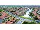 Beautiful community with lush landscaping, a lake, and mature trees at 909 W San Mateo Ct, Gilbert, AZ 85233