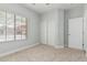 Neutral bedroom with carpet and natural light at 9224 W Raymond St, Tolleson, AZ 85353