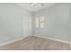 Neutral bedroom with carpet, ceiling fan and natural light at 9224 W Raymond St, Tolleson, AZ 85353